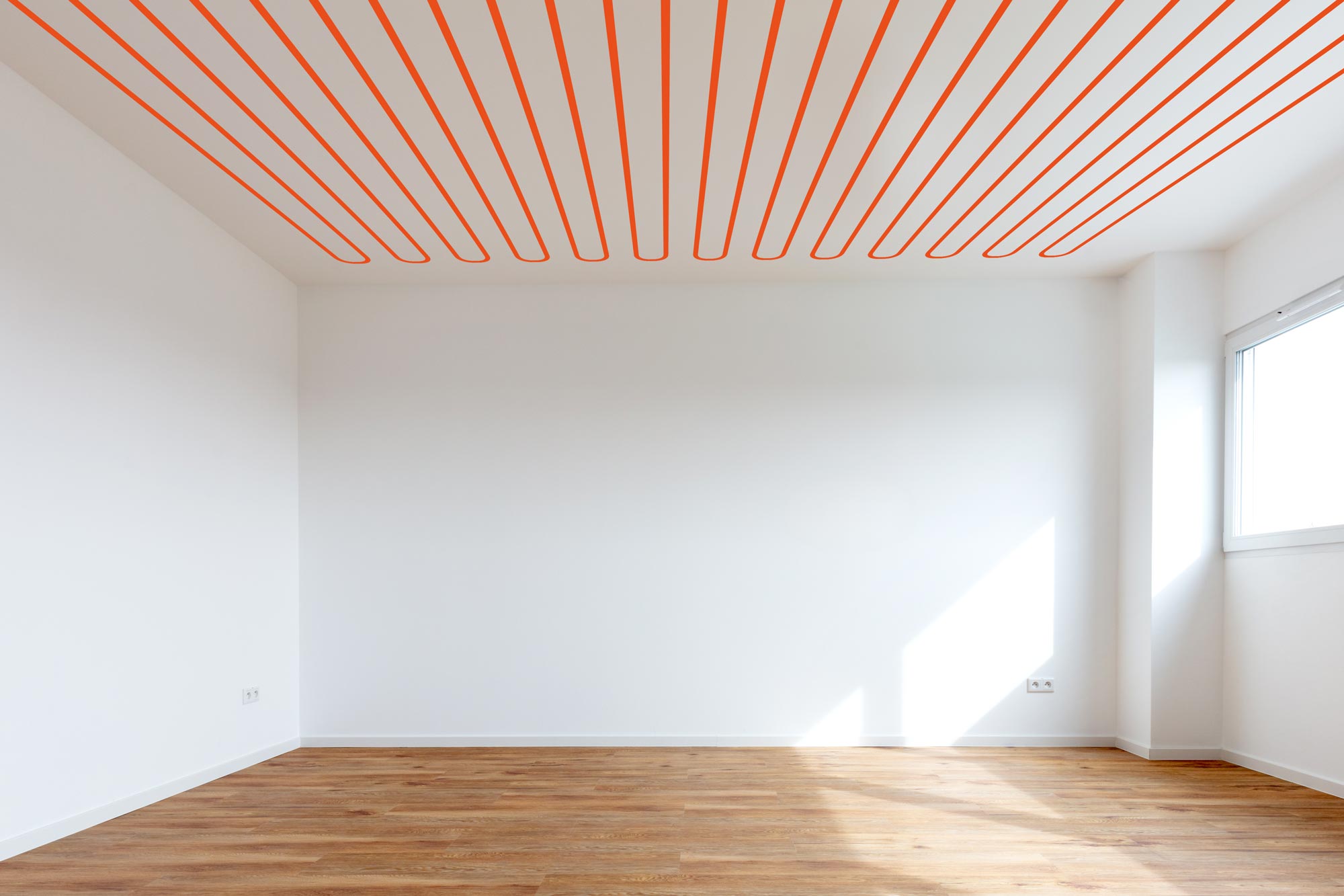 Chambre vide avec schéma incrusté d'un plafond chauffant